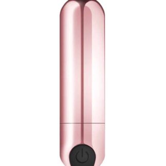 Mini vibromasseur Bullet Vibration Nomade de couleur rose gold brillant avec bouton de commande noir à la base.