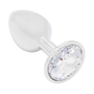 Plug anal bijou L'Étoile du Désert en aluminium poli avec un large strass transparent sur la base.