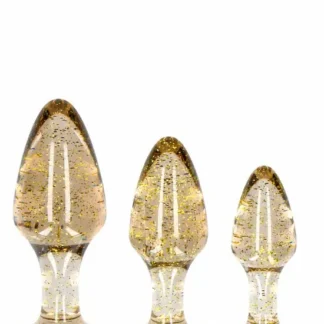 Set de plugs anaux pailletés Les Étoiles d'Orient dorés.